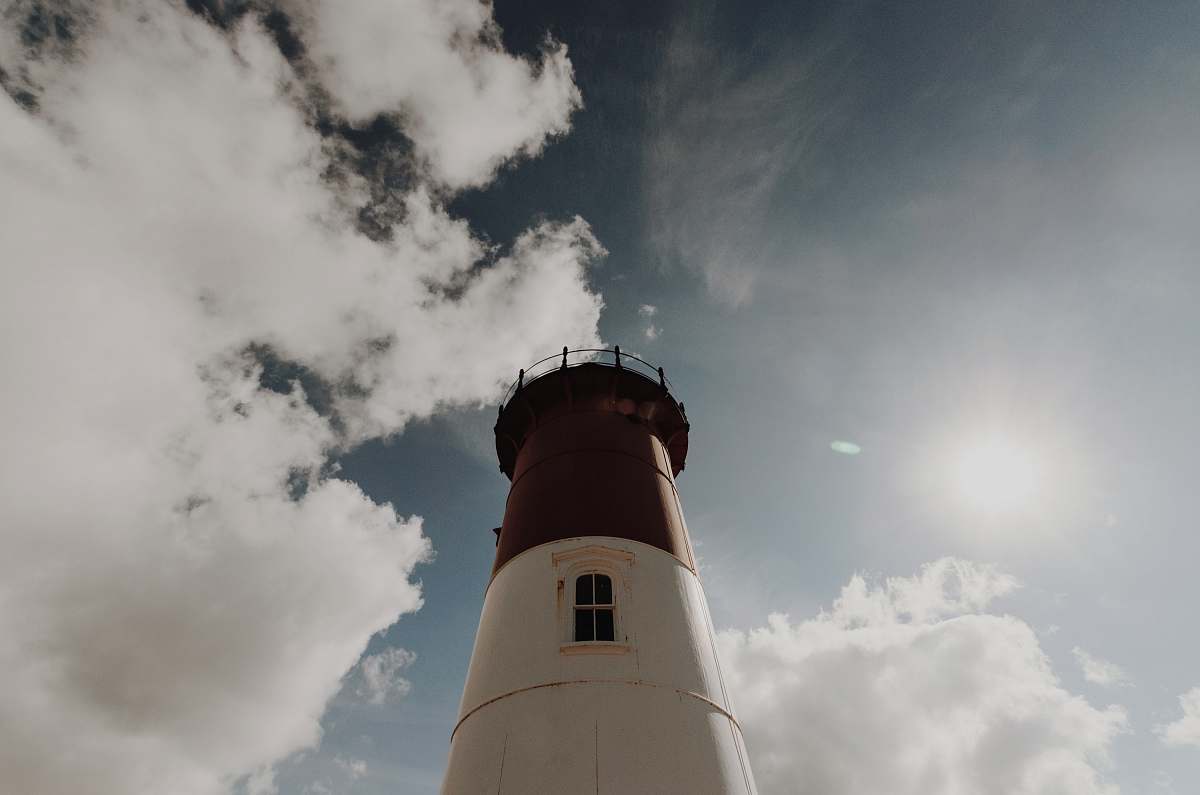 nauset lighthouse high-angle photography of white and black lighthouse tower during day time eastham